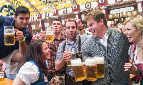 Group drinking beer - The Clumsy Traverl Guide to Oktoberfest