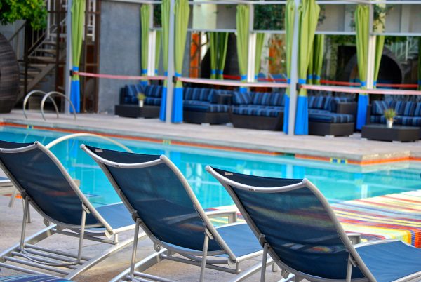 Outdoor pool lounge chairs Clarendon Hotel and Spa