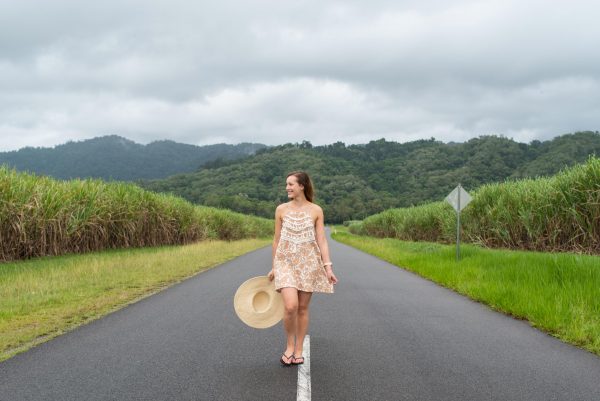 Meet Clumsy Traveler Rachel; girl walking down middle of road Queensland