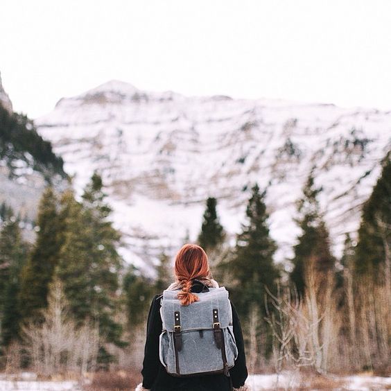 Best Travel Gift Ideas; girl hiking with ona backpack