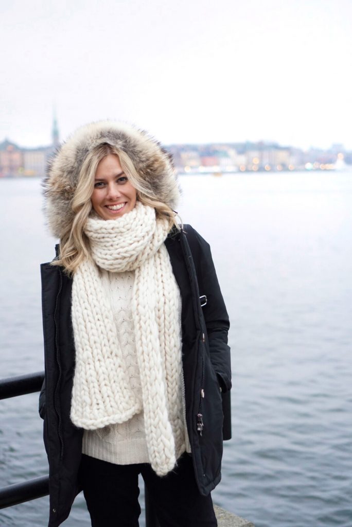 Winter Wonderland Lookbook; blonde girl in Europe chunky knit scarf and Woolrich parka