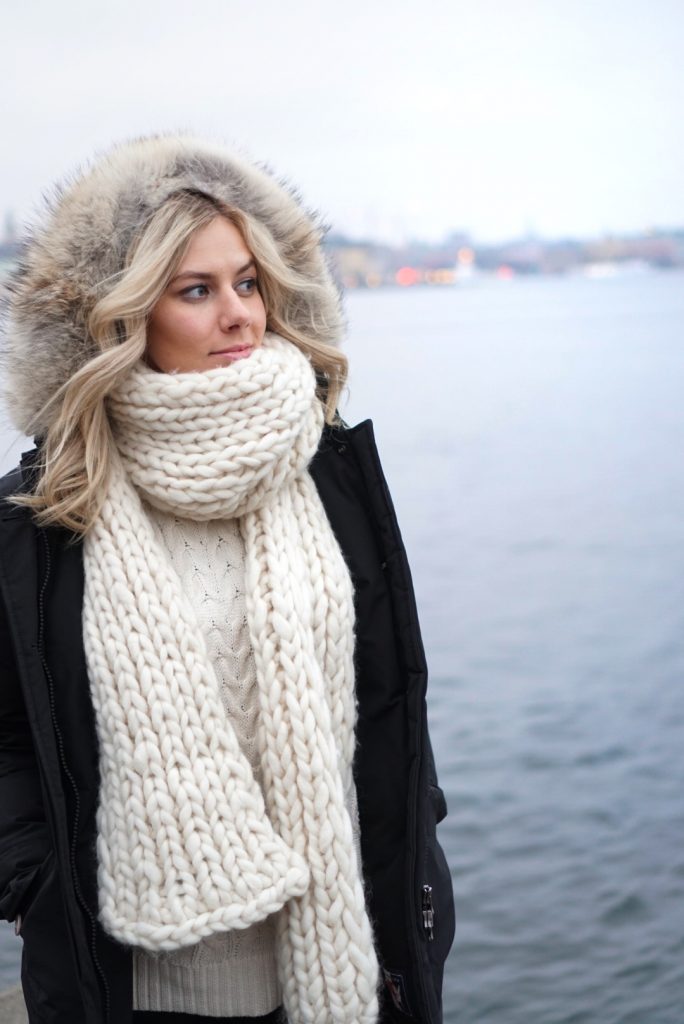 Winter Wonderland Lookbook; blonde girl in Europe chunky knit scarf and Woolrich parka