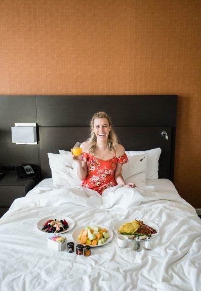Staying at the Hard Rock Hotel San Diego; girl with room service