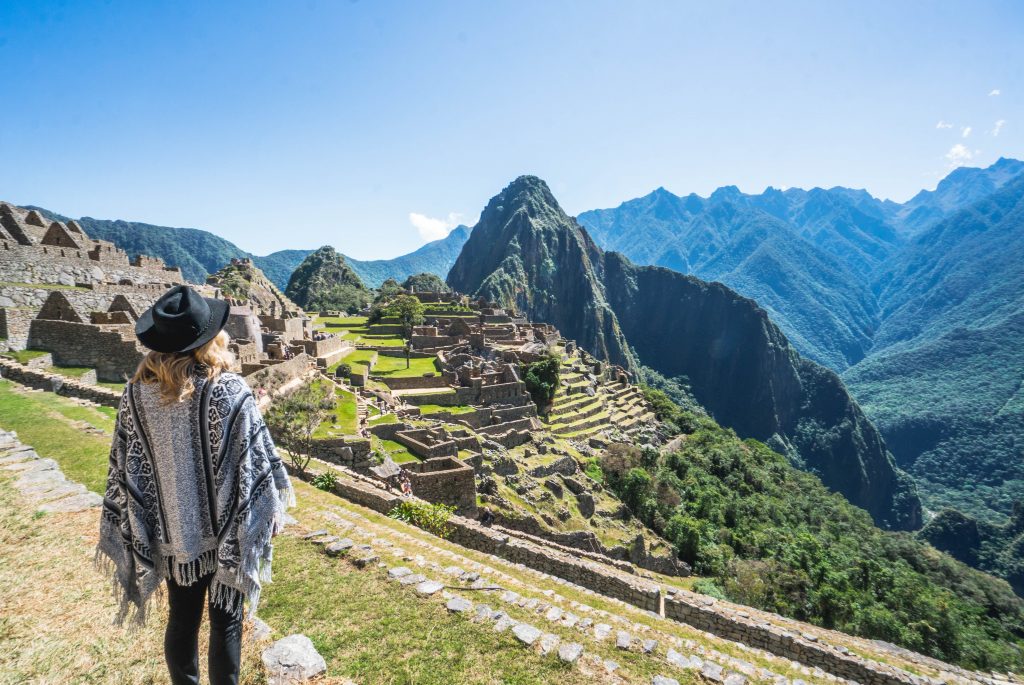 Machu Picchu's new entrance regulations; girl from above view of Huayuna Picchu