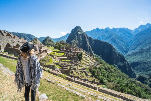 Machu Picchu's new entrance regulations; girl from above view of Huayuna Picchu