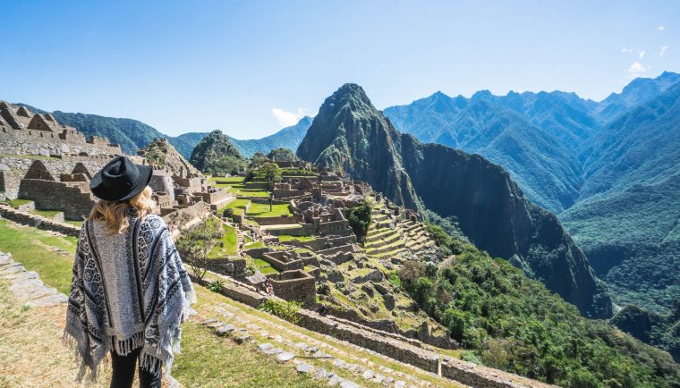 Machu Picchu's new entrance regulations; girl from above view of Huayuna Picchu