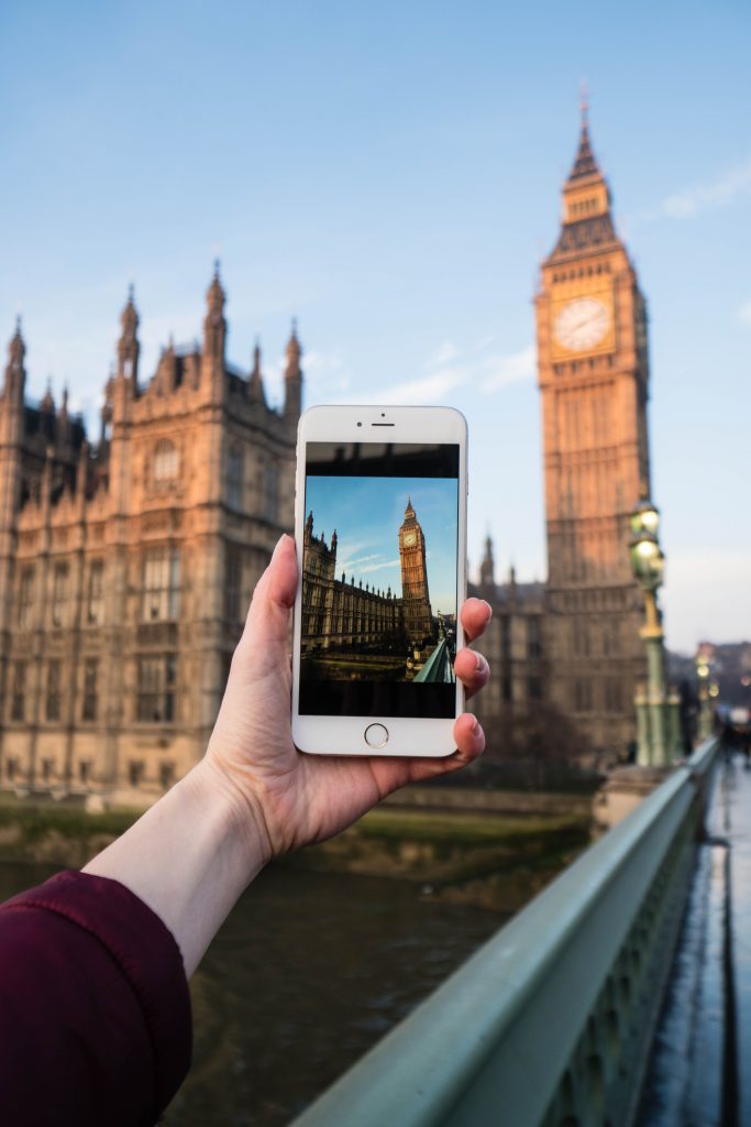social media depression; phone picture of Big Ben in london
