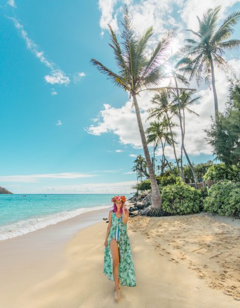 best things to do in Oahu; girl swimwear and flower crown on Lanikai beach
