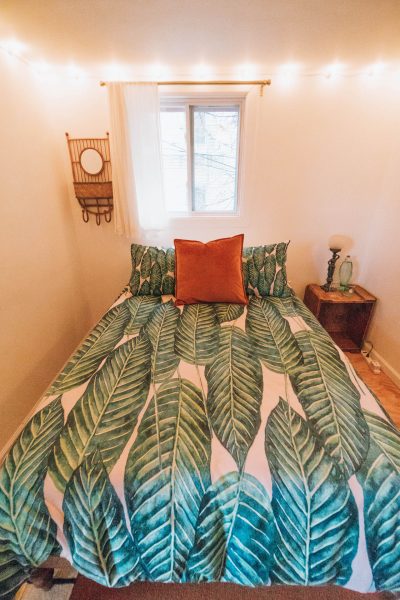 Staying at The Funky Loft in Brooklyn, New York; interior retro apartment tropical room