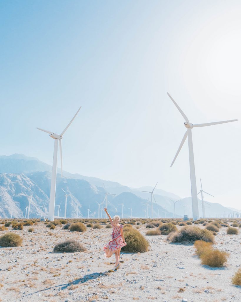 Best Photos in Palm Springs; girl in the windmill farm